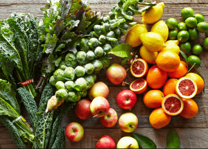 a group of fruits and vegetables on a wood surface Healthy Weight Loss Diets Faringdon